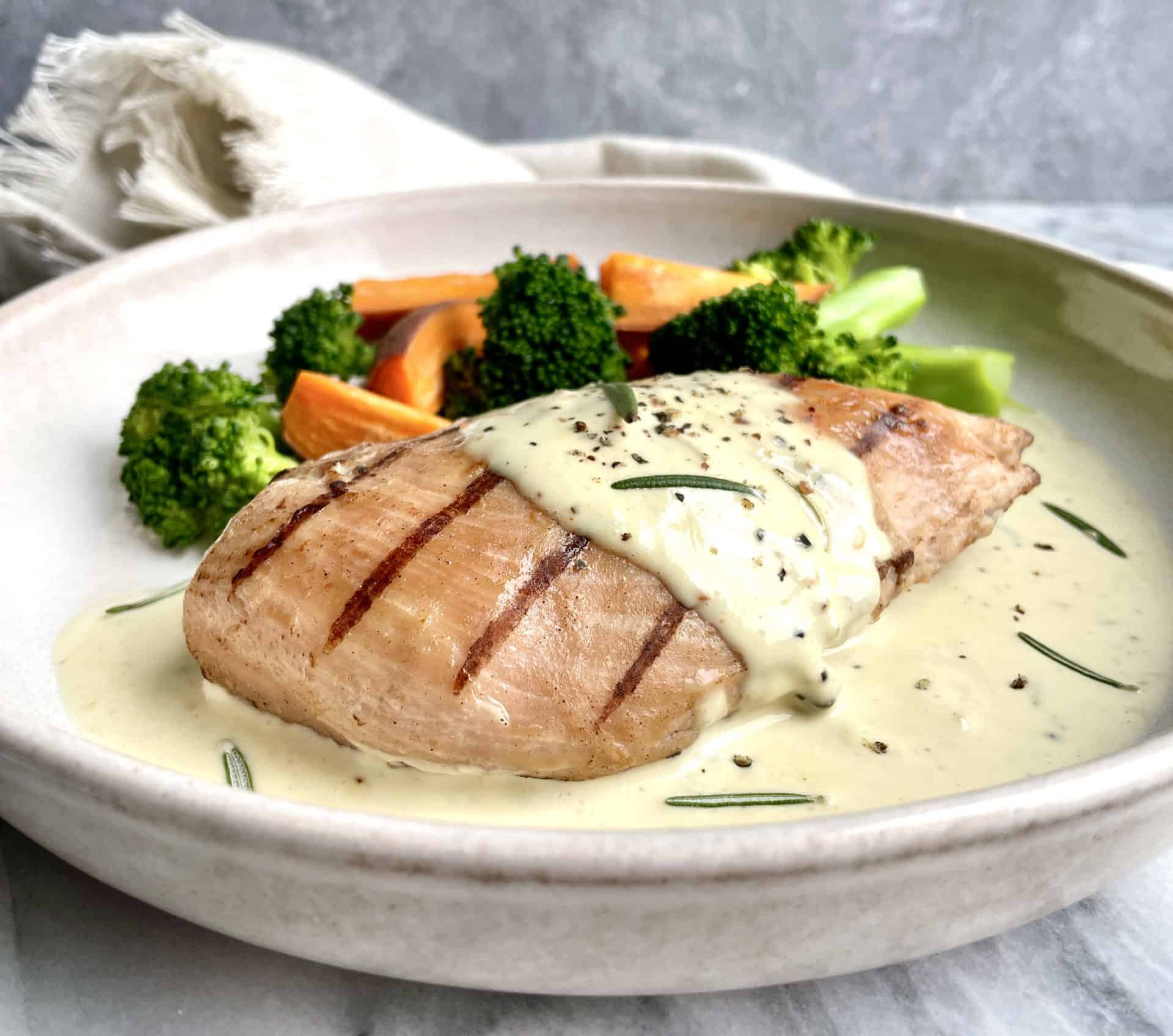 Sous Vide Chicken Breast with Rosemary Sauce on a plate